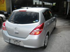 2009 NISSAN TIDA, rear three-quarter view