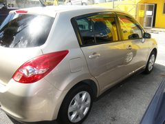 2009 NISSAN TIDA, rear three-quarter view