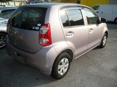 2010 TOYOTA PASSO, rear three-quarter view