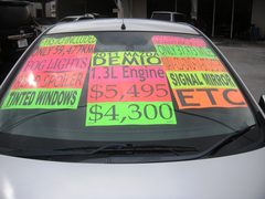 2011 MAZDA DEMIO, windshield with the price signs