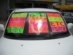 2007 TOYOTA b B, windshield with the price signs