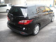 2011 MAZDA PREMACY, rear three-quarter view